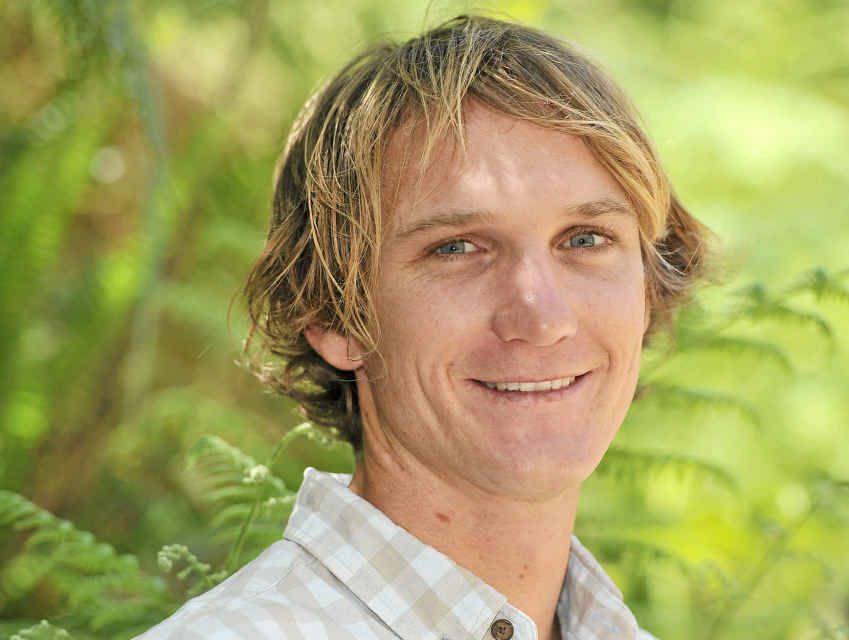 BACK IN THE WATER: Daniel Hewitt restored to health and, inset, after his 6m fall. BACK IN THE WATER: Daniel Hewitt restored to health and, inset, after his 6m fall.